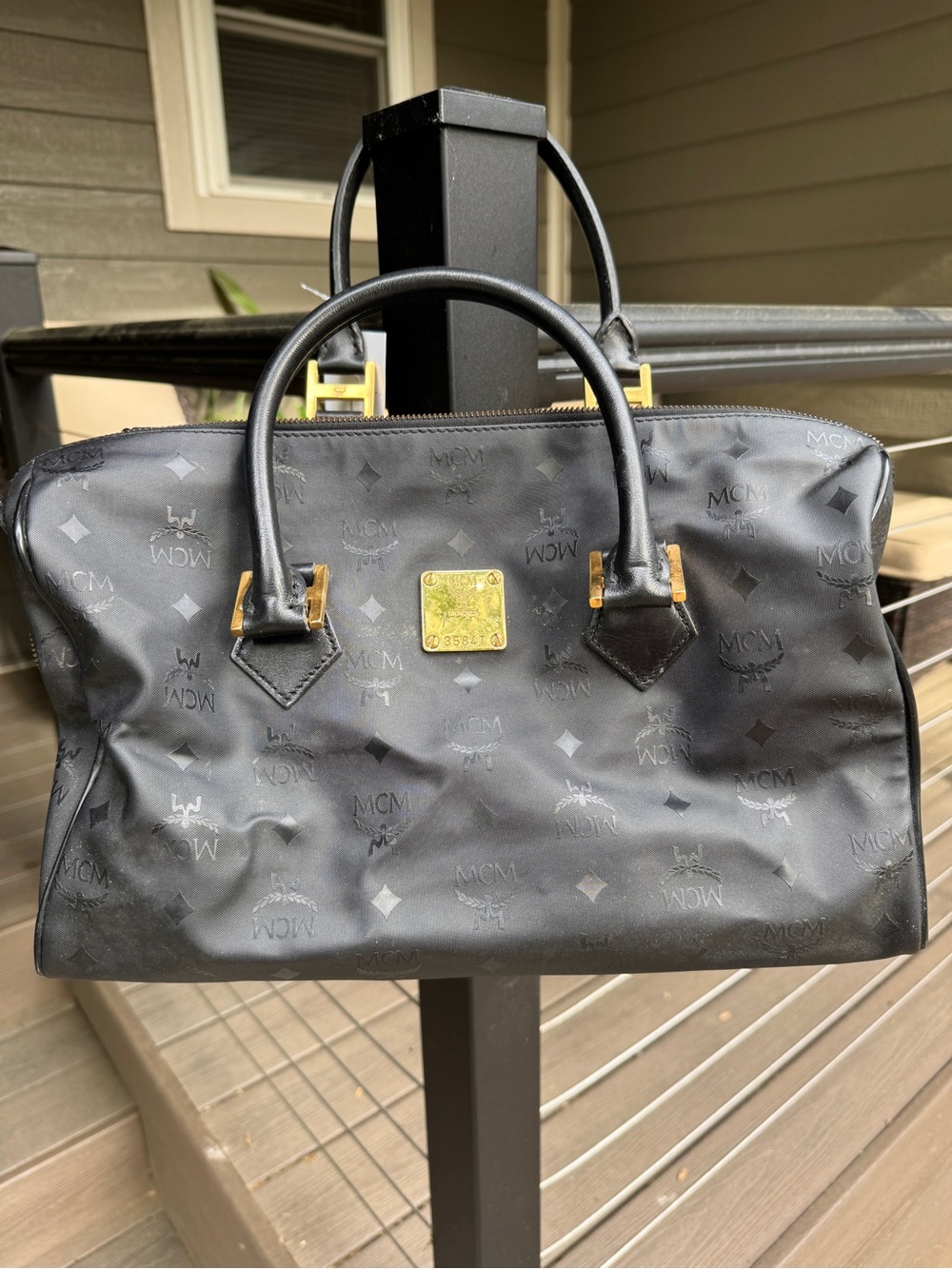 MCM Black Visetos Satchel with Gold Hardware